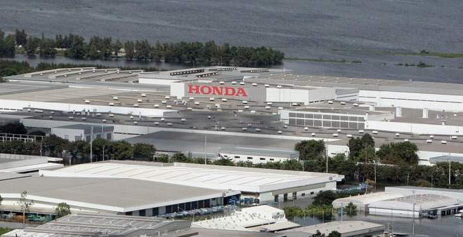 Honda Motors will scrap 1400 of its cars damaged in Thailand 